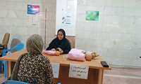 برگزاری میز خدمت ترویج تغذیه با شیر مادر در شهرک بهاران صباشهر